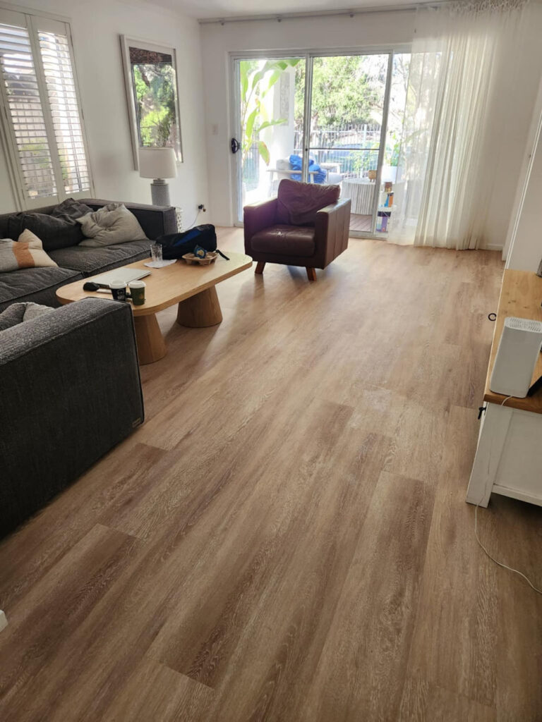 Living Room With High-quality Timber Flooring