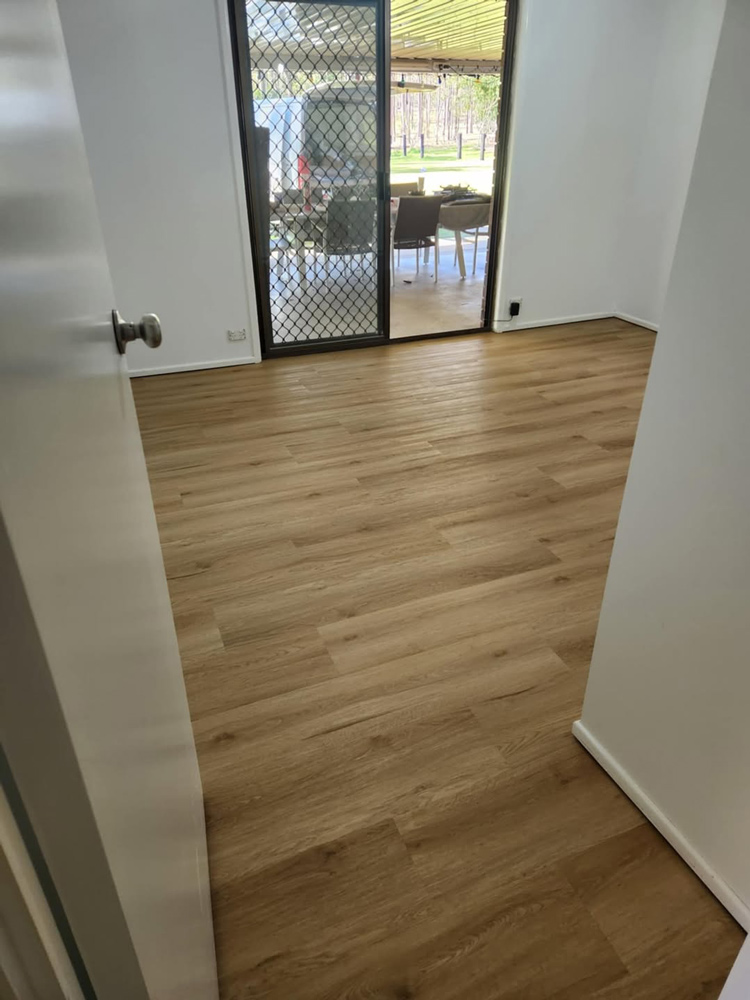 Open Doors To A Room With Timber Flooring