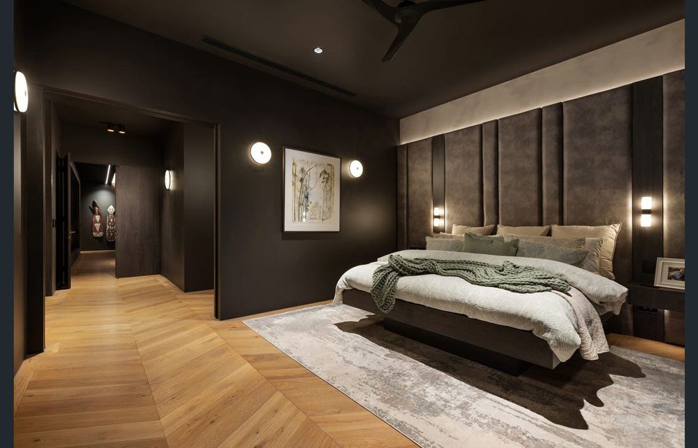 Well Lit Bedroom with Timber Flooring and Carpet