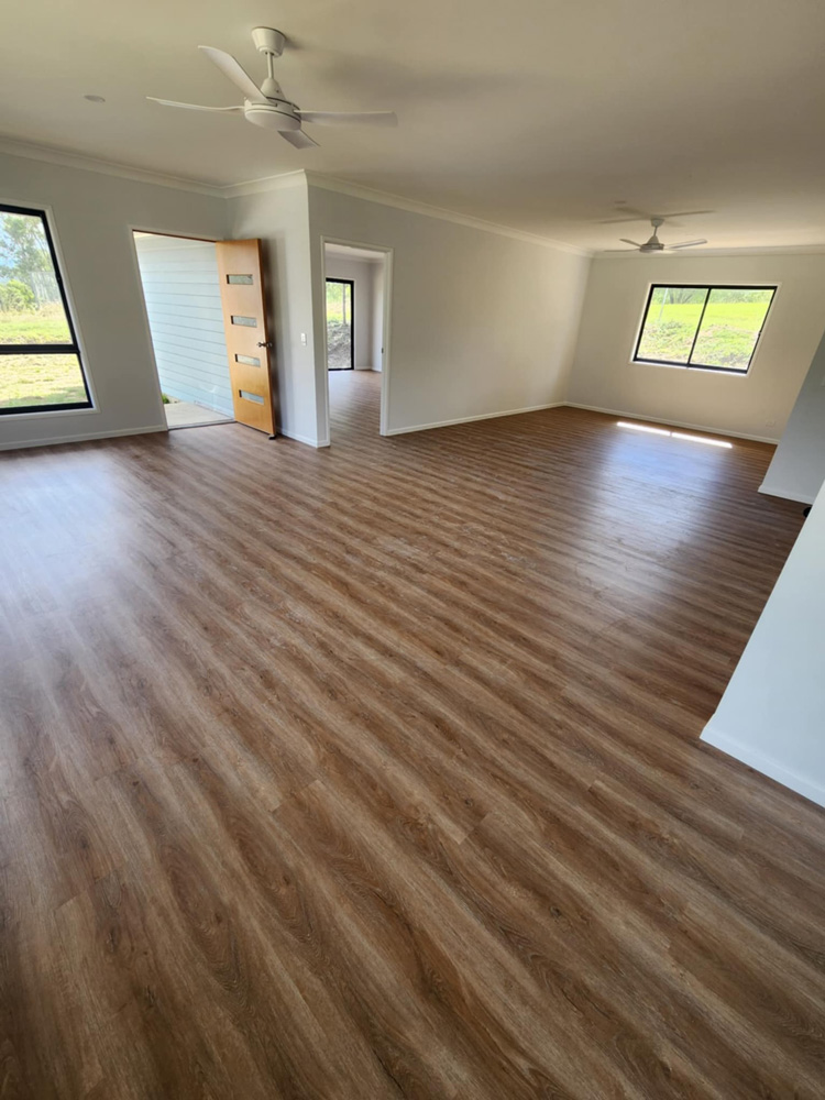 Empty Commercial Space with Laminated Flooring