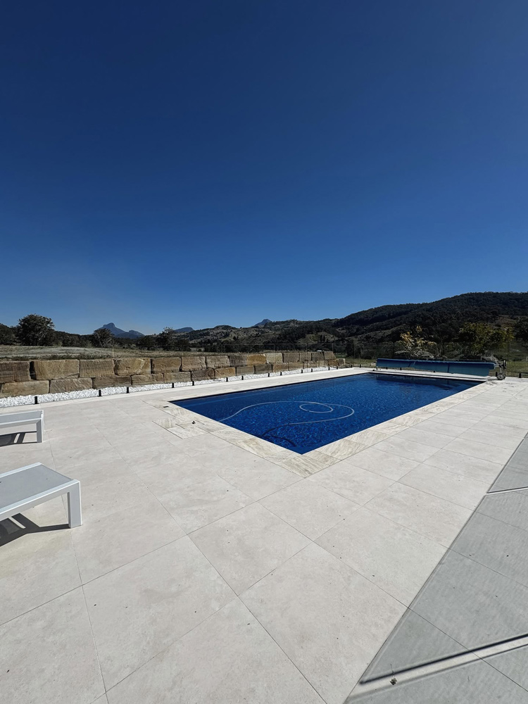 Concrete Tile Flooring Surrounding the Pool